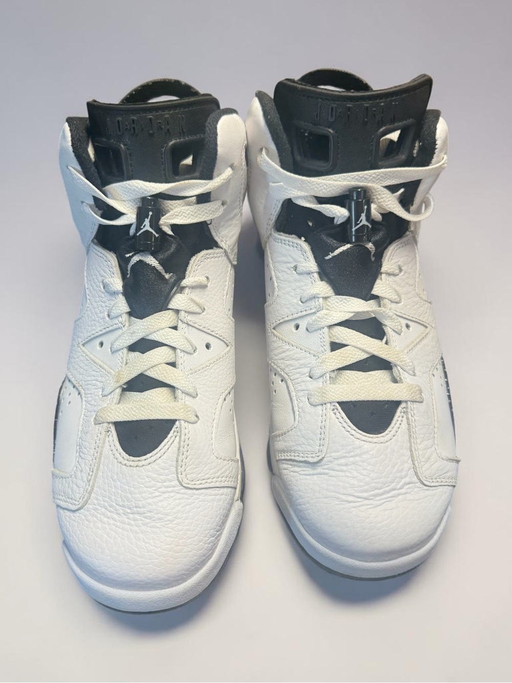 Jordan White and Black High-Top Basketball Sneakers